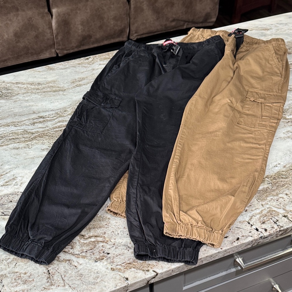 Women’s Black and Tan Cargo Pants with elastic waist and ankles.